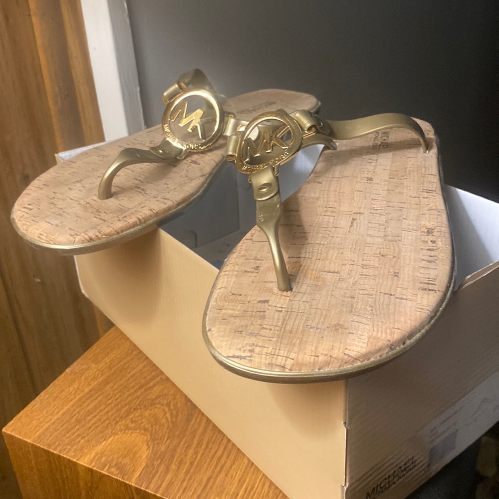 Size 8 Micheal Kors sandals new in original box but never worn.